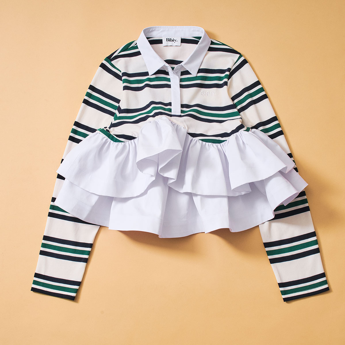 「Bibiy.」のペプラムトップス