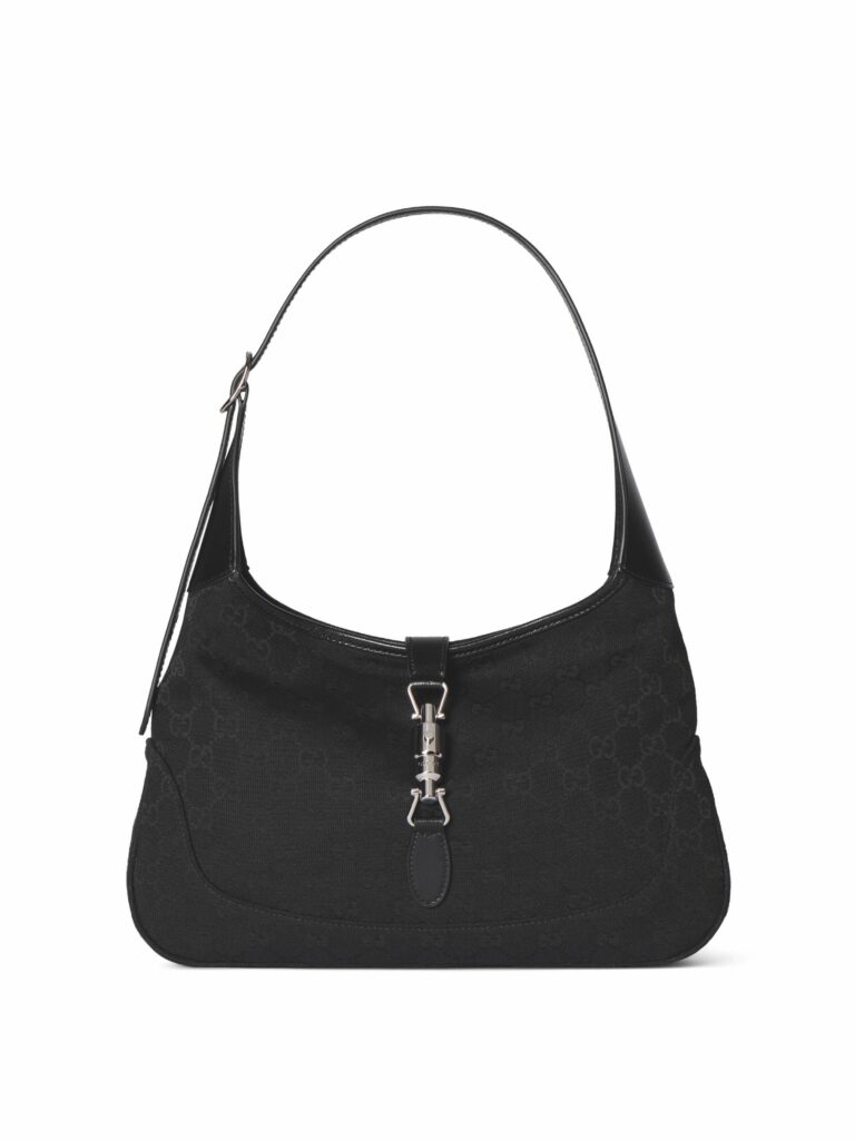 グッチ ジャッキー 1961。ブラックのGGキャンバスの半月型バッグにゴールド金具とレザーハンドル付き